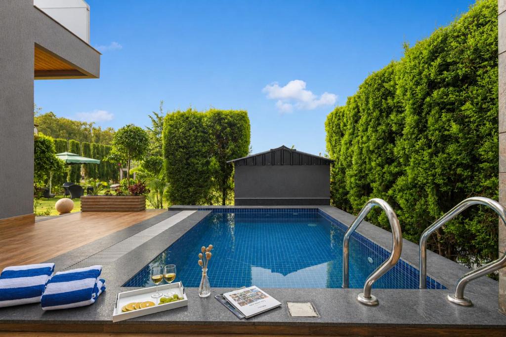 Bail Parao Villa | ELIVAAS Signature Aranya Library Maison 6BHK Villa With kids room, Private Pool, Reading Lounge, Common Lounge, Garden With Forest Views