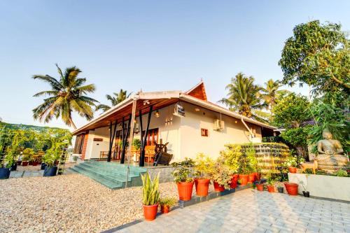 Nedumudy Villa | ELIVAAS Signature Breeze and Grains Resort 3-BHK Villa with Verandah & Outdoor Patio