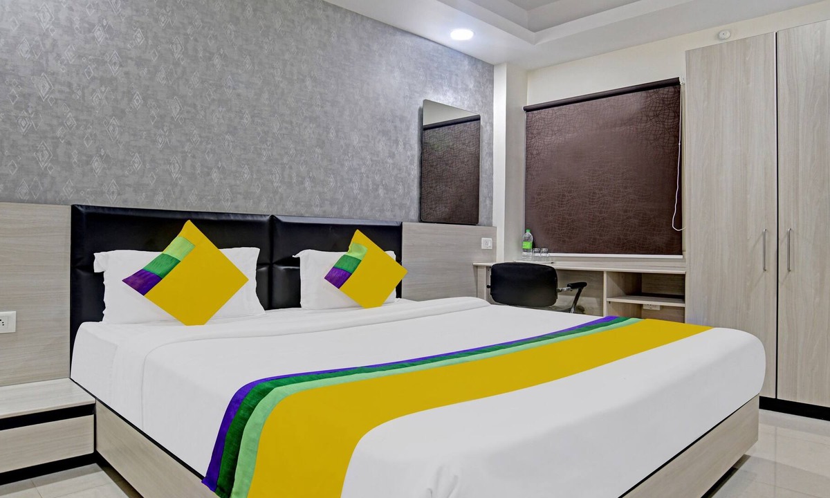 Rau Hotel | Itsy By Treebo - Lotus