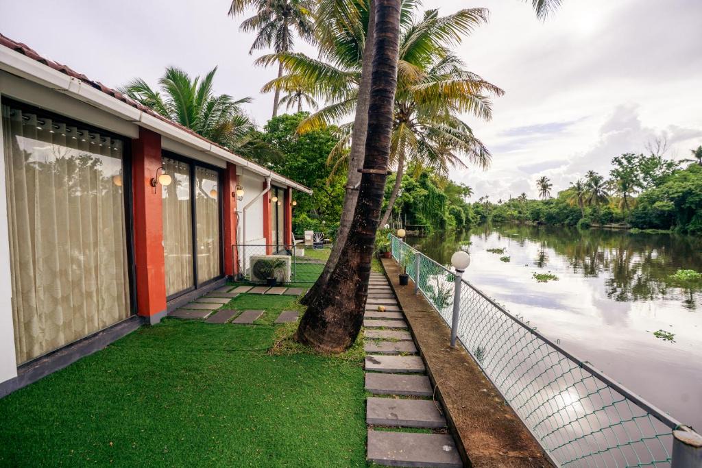 Cherthala House | Kayaloram Retreat by NexGo Spaces, Alleppey