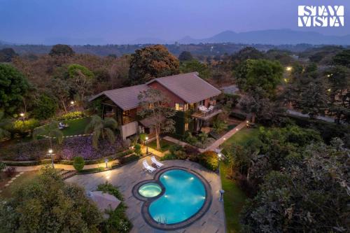 Nashik Villa | StayVista at Brickhouse Aranya with Pool and Farm View