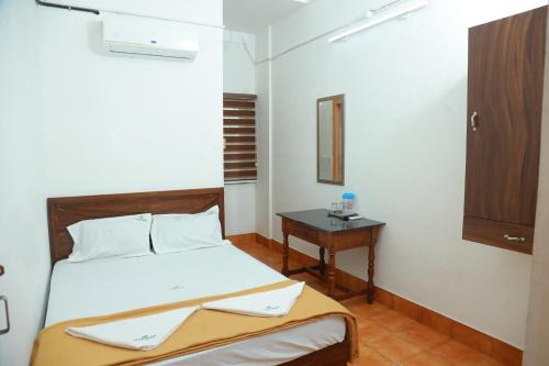 Kozhikode Hotel | Vinayaka Tourist Home