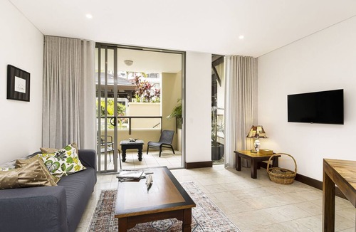 Casuarina Apartment | 119 Santai Resort - Poolside Apartment by uHoliday
