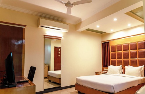 Sheshadripuram Hotel | Bisque Magaji Orchid
