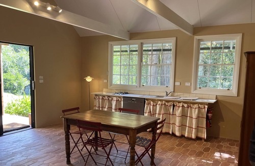 Cedar Brush Creek Cabin | Cedar cabin in serene cool setting in rainforest bush, traditional luxe