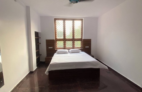 Hyderabad House | Charming 3-bedroom farmhouse in delightful Hyderabad with AC, Wi-Fi and pool.