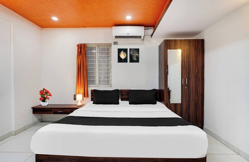 Domlur Hotel | Collection O Bangalore Airport Road