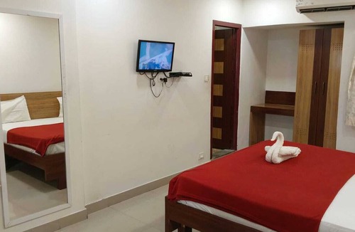 Kumbakonam Hotel | Cozy 1-bedroom hotel in tranquil Kumbakonam with AC