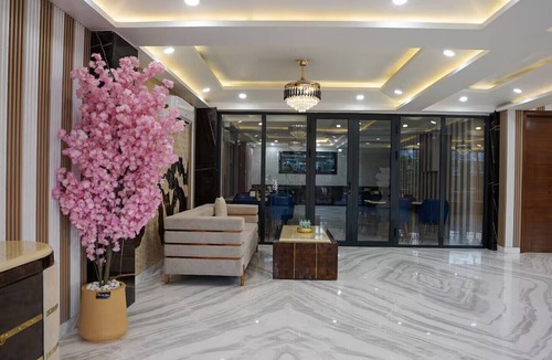 Sector 51 Hotel | Cozy Standard Bedroom at Five Palms in Sector - 57, Gurugram