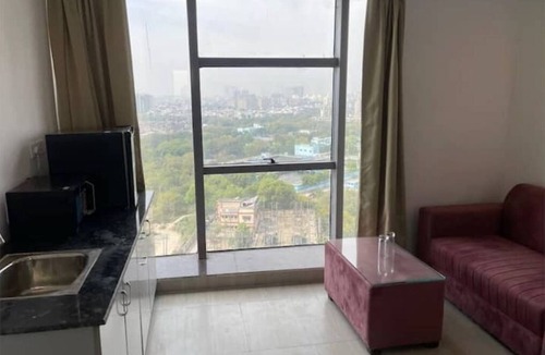 Noida Apartment | Cozy Yard | Modern Minimal Studio Near Spectrum Mall & Metro 🌿