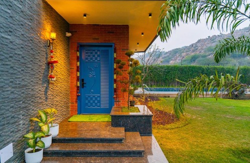 Gurugram Villa | ELIVAAS Signature Prassanam Vatika 2-BHK Hillside Villa with Private Pool & Expansive 1-Acre Garden