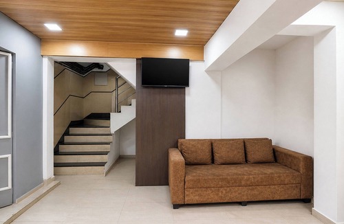 Thergaon Hotel | Fabhotel Arusai Inn