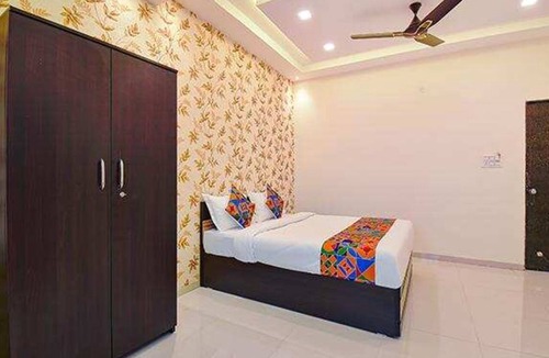 Paud Hotel | FabHotel Golden Heights