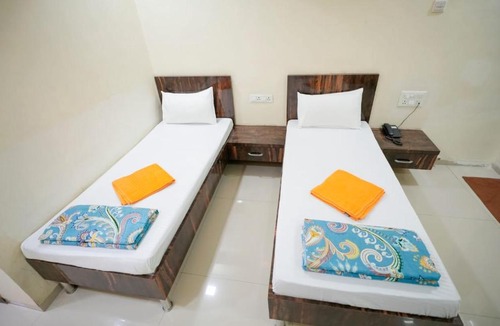 GIDC House | hotel green ac&non ac rooms