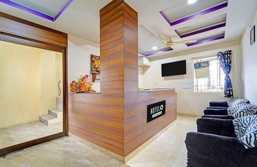 Dindigul House | Hotel O Dindugal Bus Terminal GK Building
