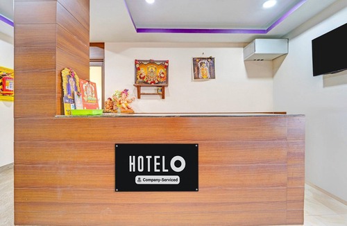 Dindigul House | Hotel O Dindugal Bus Terminal GK Building