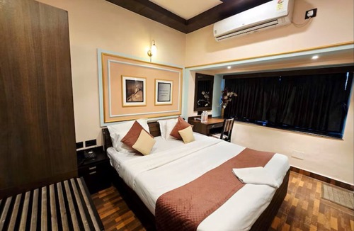Bhowanipore Hotel | Hotel Trimoorti