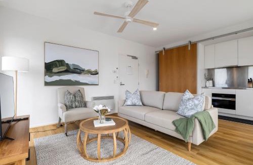 East Melbourne Apartment | Modern 1BR Apt with Generous Balcony, Parking & Pool