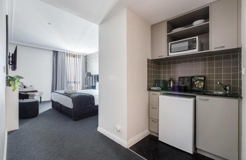 Chinatown Apartment | Modern Nomads Classic Styled King Studio with Indoor Pool