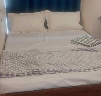 Surat Hotel | OYO 70084 Hotel Blue Sky