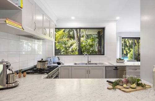 Rosebud House | Poolside Palms Oasis