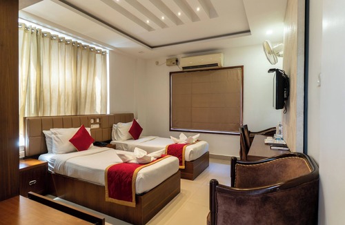 Kozhikode Hotel | Royal Plaza Glitz Inn