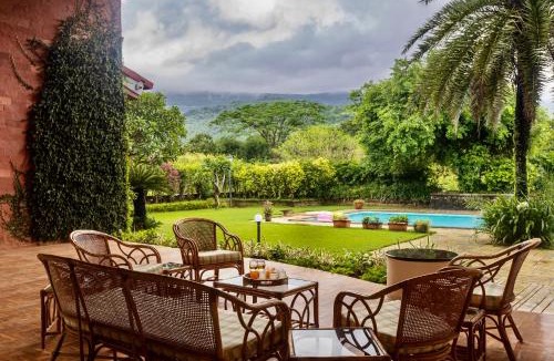Karjat Villa | SaffronStays Ananya - 4BR villa with pool, minibar & game room near river Ullas in Karjat