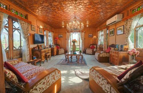 Dal Lake Boat Rental | SaffronStays Kingori Houseboat - luxury houseboat with private deck, shikara high tea & lake views