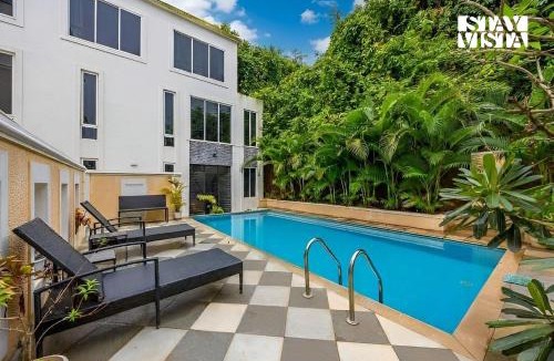Mandrem Apartment | StayVista at Corville Apartments with BBQ