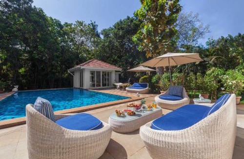 Awas Villa | StayVista's Hamptons Charm - 5BHK Villa with Heated Pool & Bar