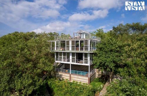 Anjaneri Villa | The Glasscape by StayVista - Hillside getaway with Pool and Indoor games