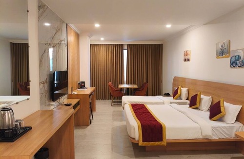 Manipal Hotel | THE HIGH POINT INN & SUITE