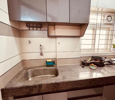 Palm Meadows Apartment | Tranquil 1BHK - Ideal for Couples & Travellers
