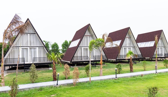 Alaya Stays Malik Farms Wooden Cottages