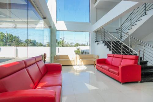 Hotel O Cosmopolitan in Devanahalli-Bangalore
