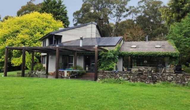 Mid century farmhouse located in the heart of Exeter Village. in Exeter