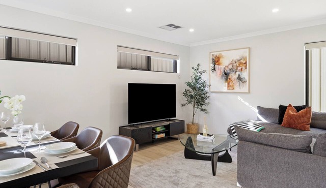 Newly built two-storey townhouse in the heart of Bentley — ideal for families, groups & corporate stays. Modern interiors, gourmet kitchen, private alfresco & a Nespresso on us. in Bentley