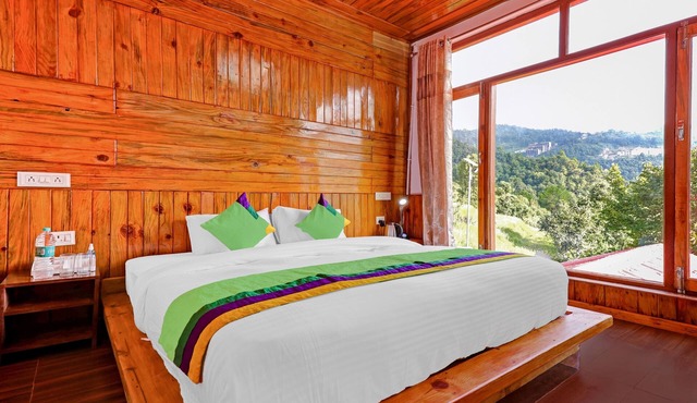 Treebo Om Villa With Mountain View in Dhari