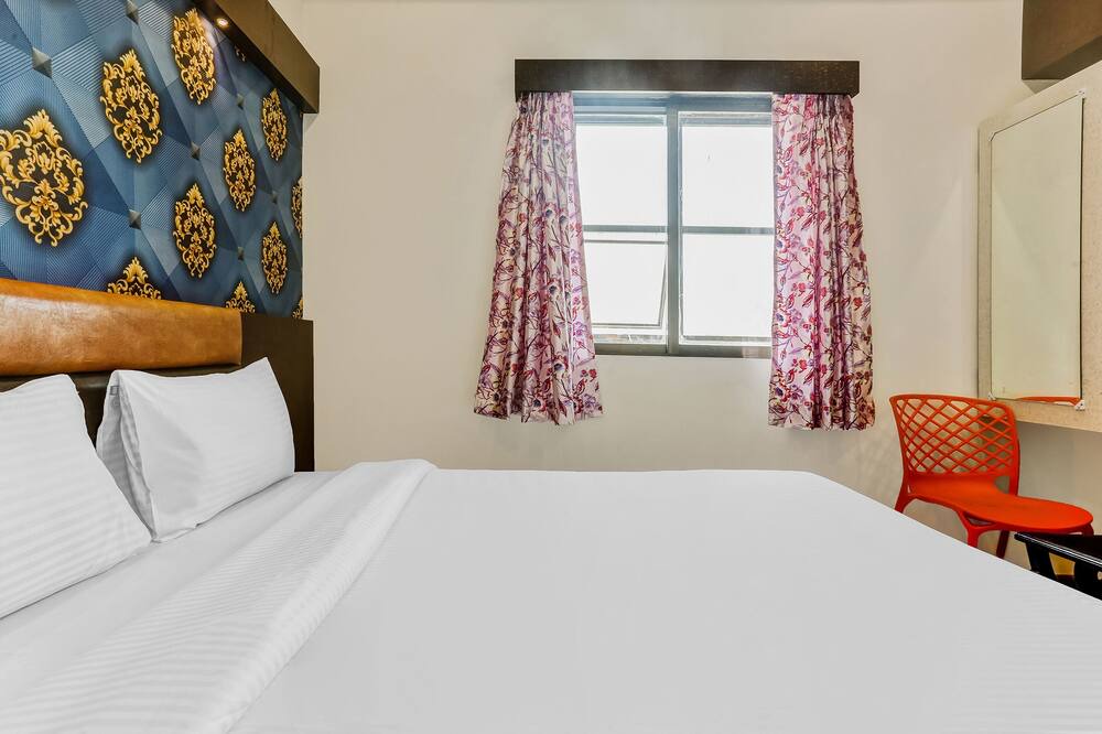 Nerul Hotel | Capital O Hotel Geeta Palace