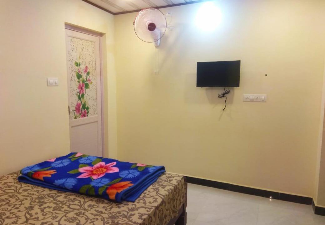 Photo of Bedroom in Valparai