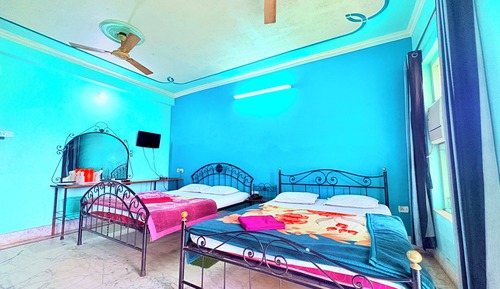 Deluxe Quadruple Room, City View