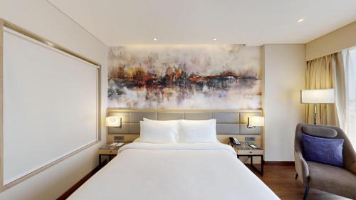 Deluxe Room with 15% off on Session of Spa and 10% off on Laundry Services, free snacks, soft drinks & fruit platter