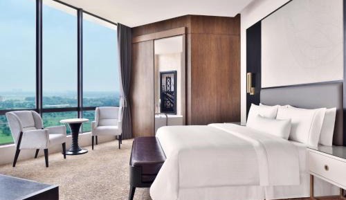 Lake View Suite with Lounge Access, 20% F&B Discount, Happy Hours (1 + 1 IMFL - 4 pm to 8 pm at 31/32) & 2 Way Airport Transfers