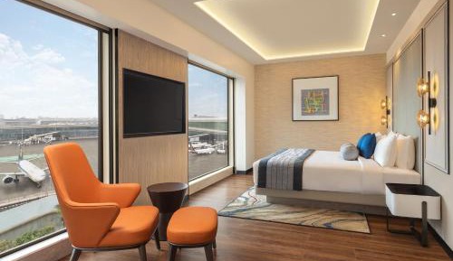 Presidential King Suite with Sofa Bed and Courtyard View