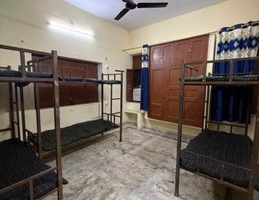 Single Bed in Dormitory Room