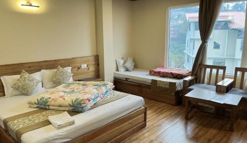 Deluxe Room (2 Adults + 1 Child)