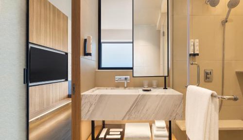 Executive King Suite with Sofa Bed and Courtyard View with 50% discount on Buffet , 10% off on Airport Transfers , Laundry and Happy Hours on beverages enjoy 1+1 offer on select beverages