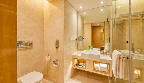 Twin Room Standard Smoking with 15% off on Laundry, Dining, Spa, and Airport Transfers and Happy Hour at 72 Bar with buy 1 get 1 free on select beverages from 7pm - 9 PM