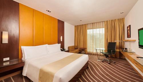 Premium King Room - Lounge Access with 15% off on Laundry, Dining, Spa, and Airport Transfers and Happy Hour at 72 Bar with buy 1 get 1 free on select beverages from 7pm - 9 PM