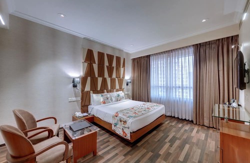 Girgaon Hotel | Adiva Residency Beacon, Grant Road, Mumbai